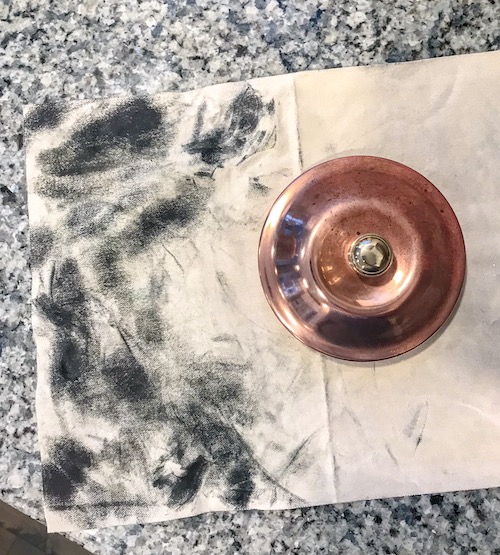 Cleaning a Copper Kettle with a Microfiber Cloth