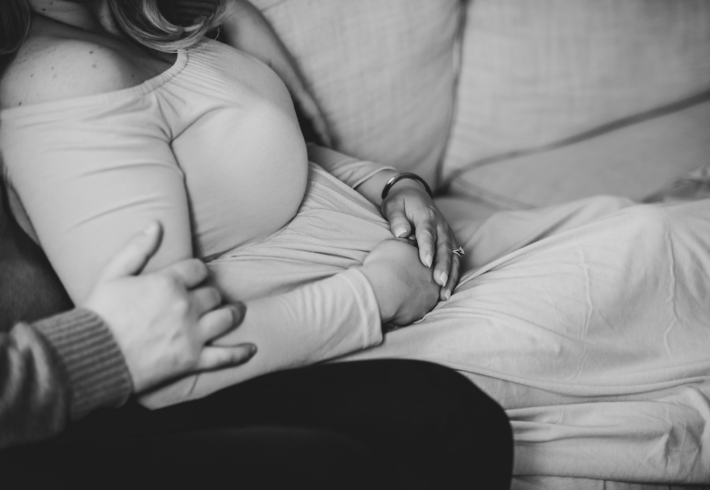 Black White Maternity Photo Holding Belly